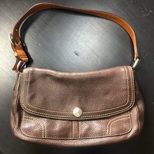 Brown Coach Handbag.